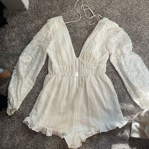 Long sleeve white romper. Perfect for the fall brides!!